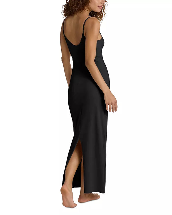 Woman wearing Commando Debutante Slip in Black on a white background well heeled stowe vt backview