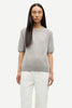 Woman wearing grey SAMSØE SAMSØE Saboston T-Shirt in Elephant Skin on a white background