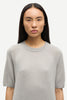 Woman wearing grey SAMSØE SAMSØE Saboston T-Shirt in Elephant Skin on a white background