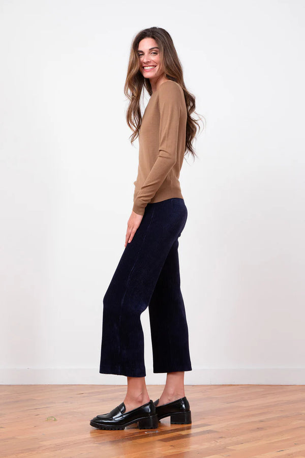woman wearing Avenue Montaigne Alex Wide Leg Crop in Navy Cord well heeled vt side view