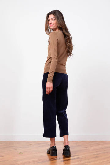 woman wearing Avenue Montaigne Alex Wide Leg Crop in Navy Cord well heeled vt back view