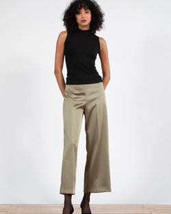woman wearing Avenue Montaigne Alex Crop Wide Leg in Olive Satin well heeled stowe vt