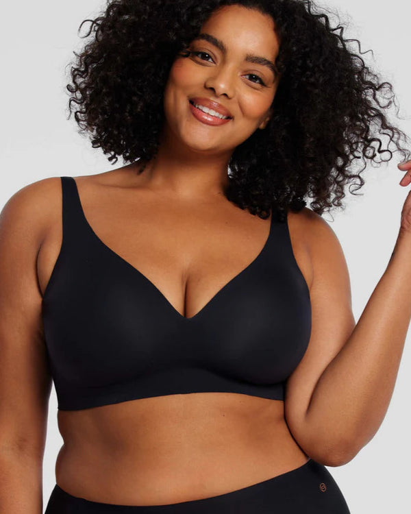 woman wearing Evelyn & Bobbie Starlette Plunge Bra in Black white background