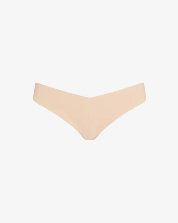 Commando Classic Solid Thong in Beige on white background