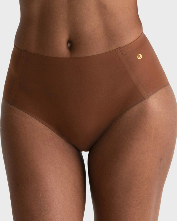 woman wearing Evelyn & Bobbie High Waisted Retro Bikini in Clay on white background
