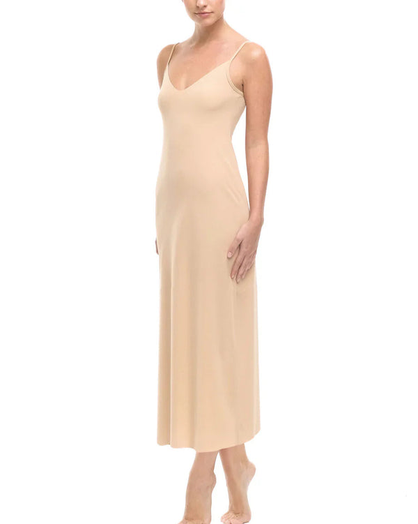 Woman wearing Commando Classic Maxi Slip in Nude against a white background well heeled boutique stowe vt