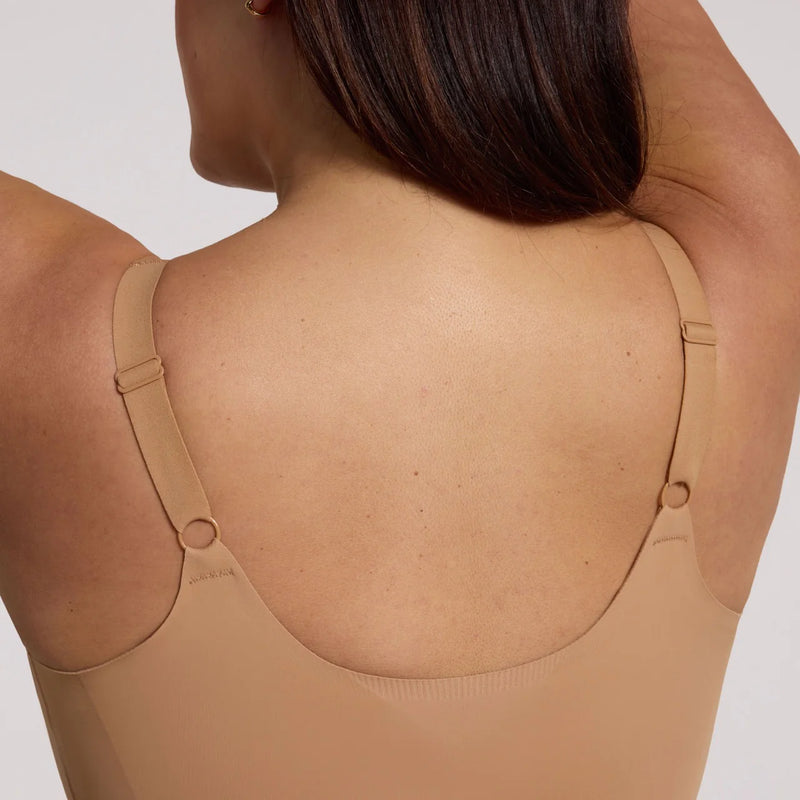 woman wearing Evelyn & Bobbie Structured Scoop Bra Cami in Mica white background backview