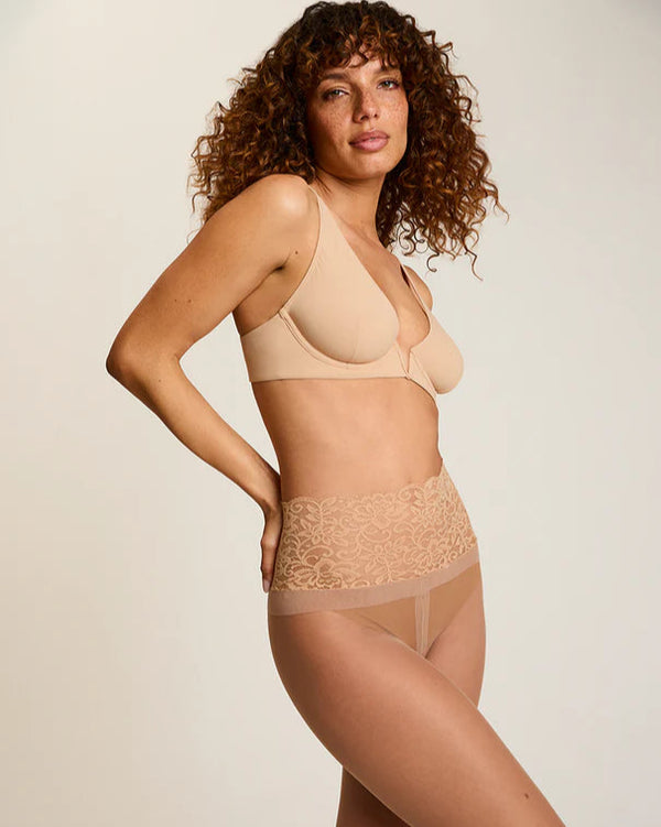 Woman wearing Commando The Sexy Sheer Tights in beige on a white background well heeled boutique stowe vt