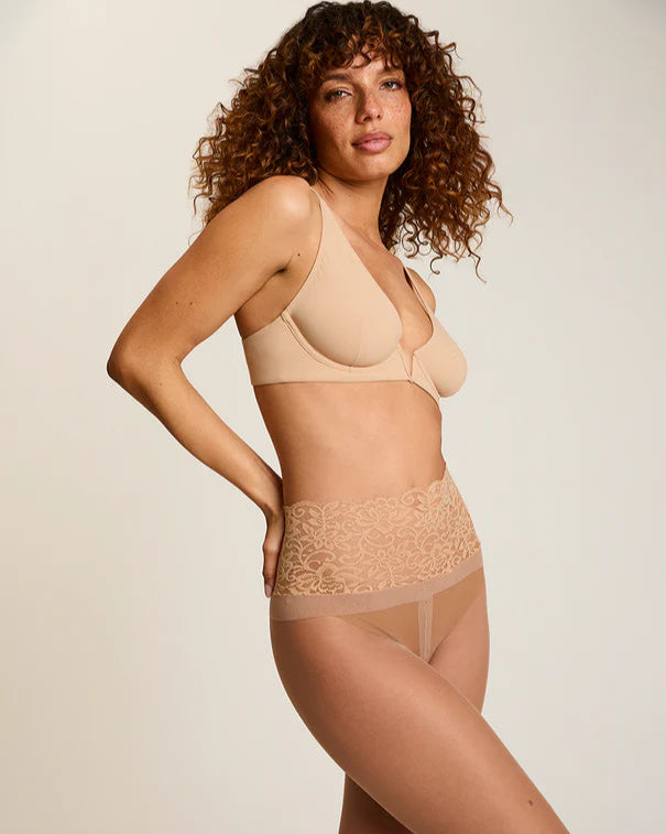 Woman wearing Commando The Sexy Sheer Tights in beige on a white background well heeled boutique stowe vt