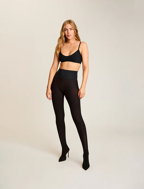 woman wearing Commando The Ultimate Opaque Matte Tights in Black on white background well heeled boutique stowe vt
