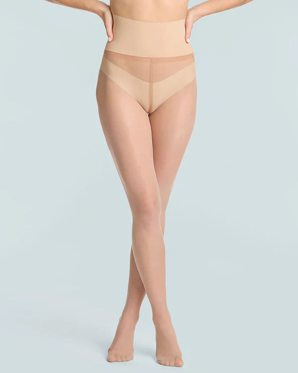 woman wearing Commando The Keeper Sheer Tights in Light Nude on white background