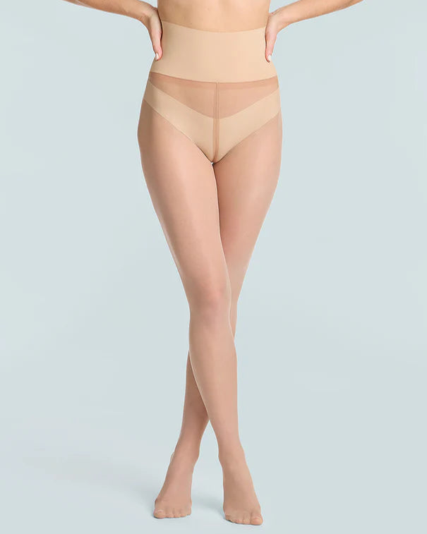 woman wearing Commando The Keeper Sheer Tights in Light Nude on white background