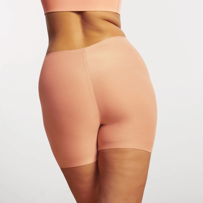 pink Evelyn & Bobbie Longline Girlshort/Slip Short Himalayan Salt shapewear shorts on a plain background backview