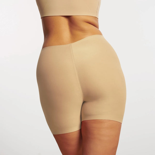 Evelyn & Bobbie Longline Girlshort/Slip Short in Sand Beige shapewear shorts worn by a model on white background