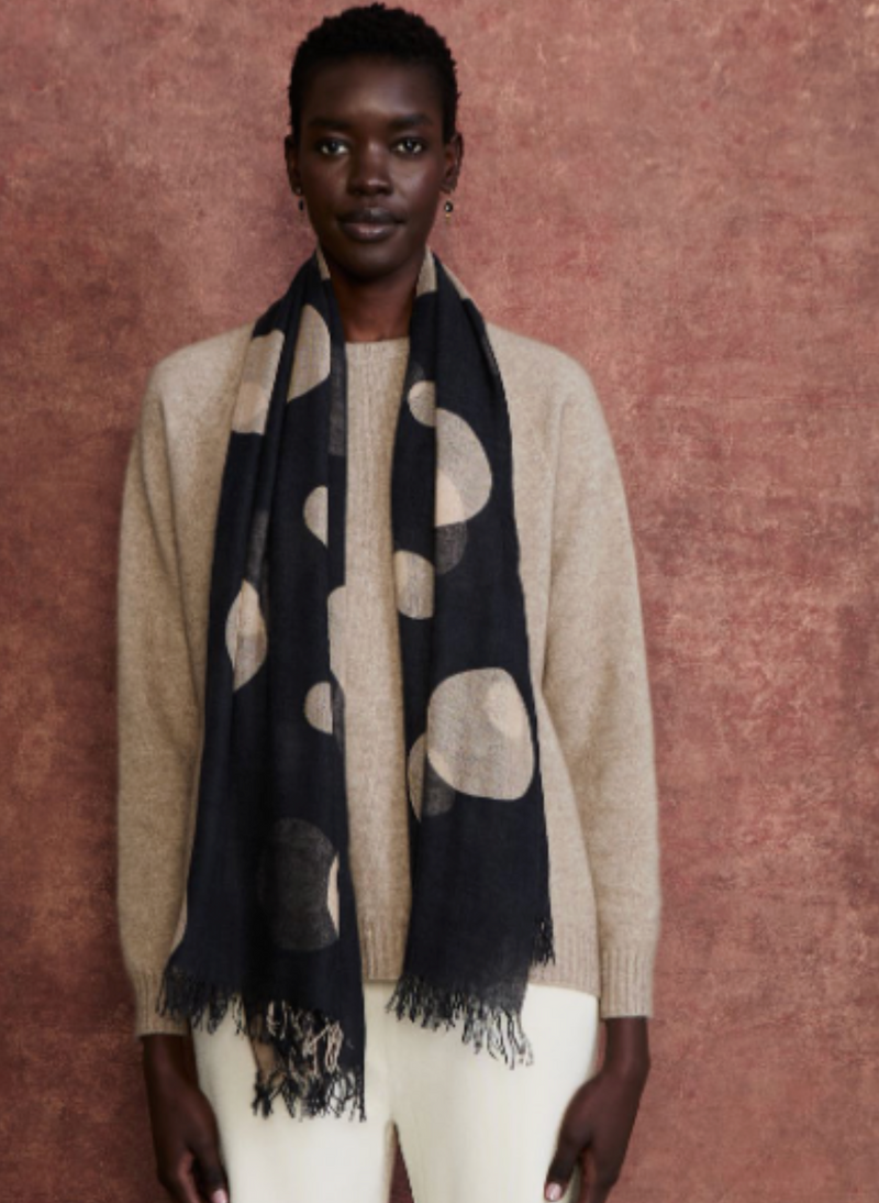 woman wearing Chan Luu Cashmere & Silk Scarf in Black Creme Polka Dots on white background well heeled stowe vt
