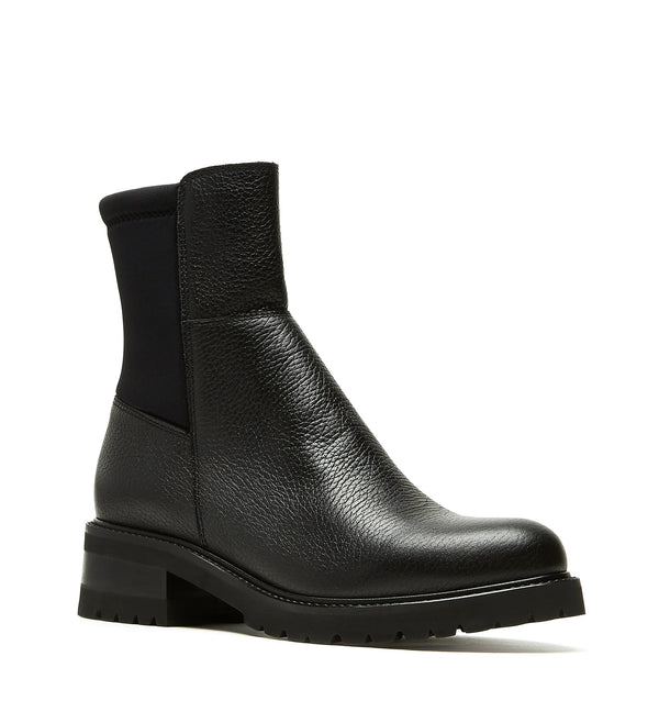 La Canadienne Calix Pebble Leather Bootie in Black Pebble on white background well heeled vt