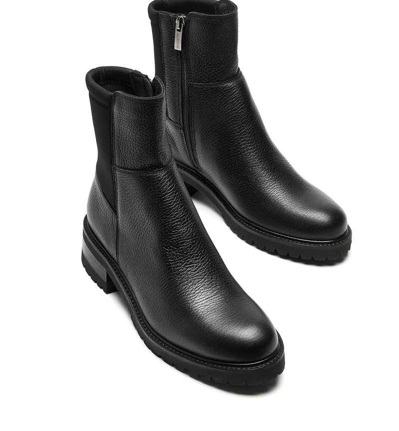 pair of La Canadienne Calix Pebble Leather Bootie in Black Pebble on white background well heeled vt