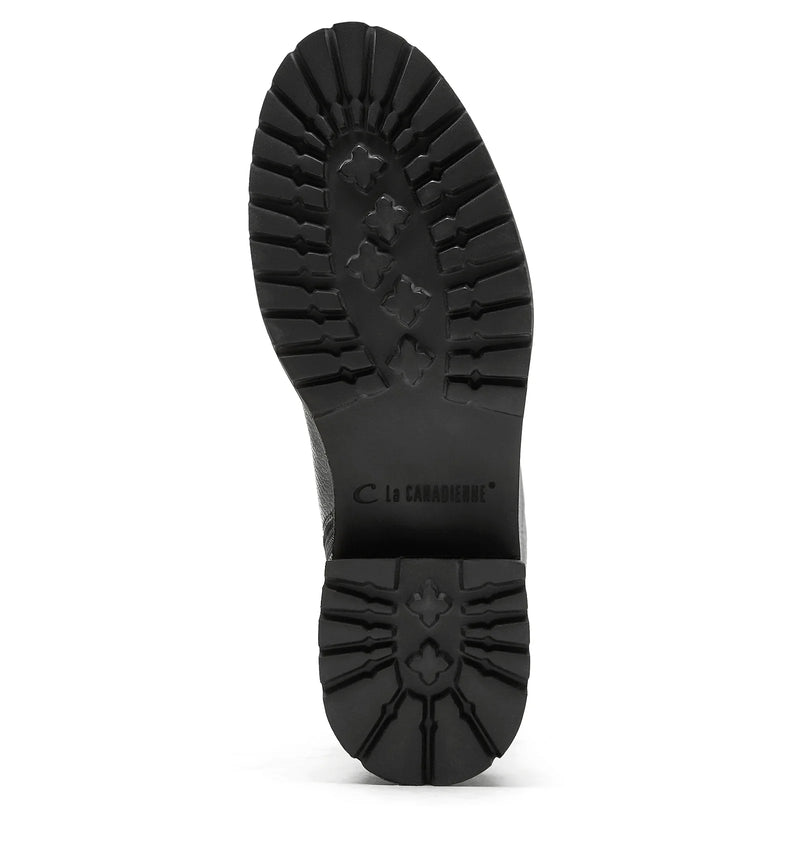La Canadienne Calix Pebble Leather Bootie in Black Pebble on white background well heeled vt