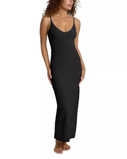 Woman wearing Commando Debutante Slip in Black on a white background well heeled stowe vt