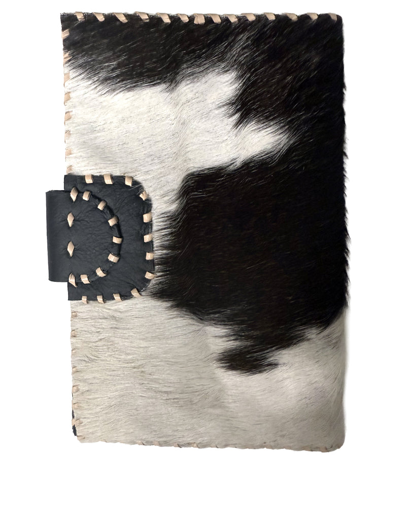 Studio Caleidoscope Lao Passport Wallet in Black Cowprint at well heeled stowe vermont