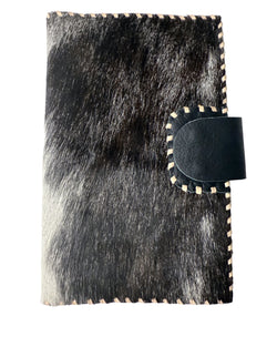 Studio Caleidoscope Lao Passport Wallet in Black Cowprint at well heeled