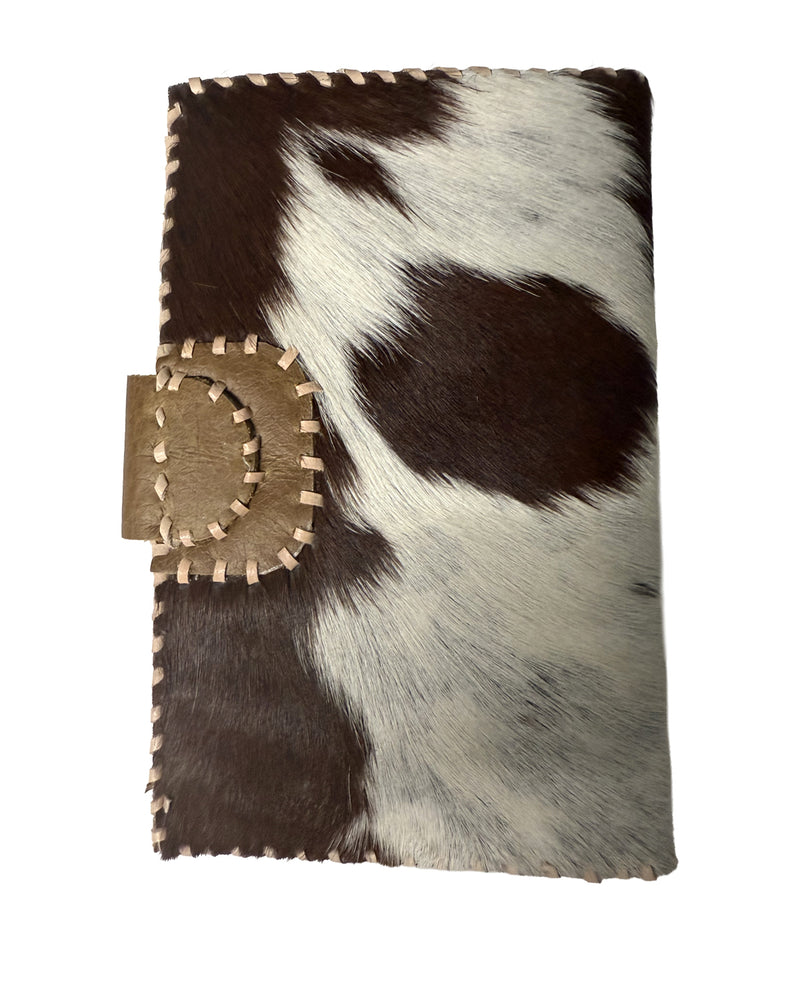 Studio Caleidoscope Lao Passport Wallet in Brown Cowprint at well heeled stowe vermont