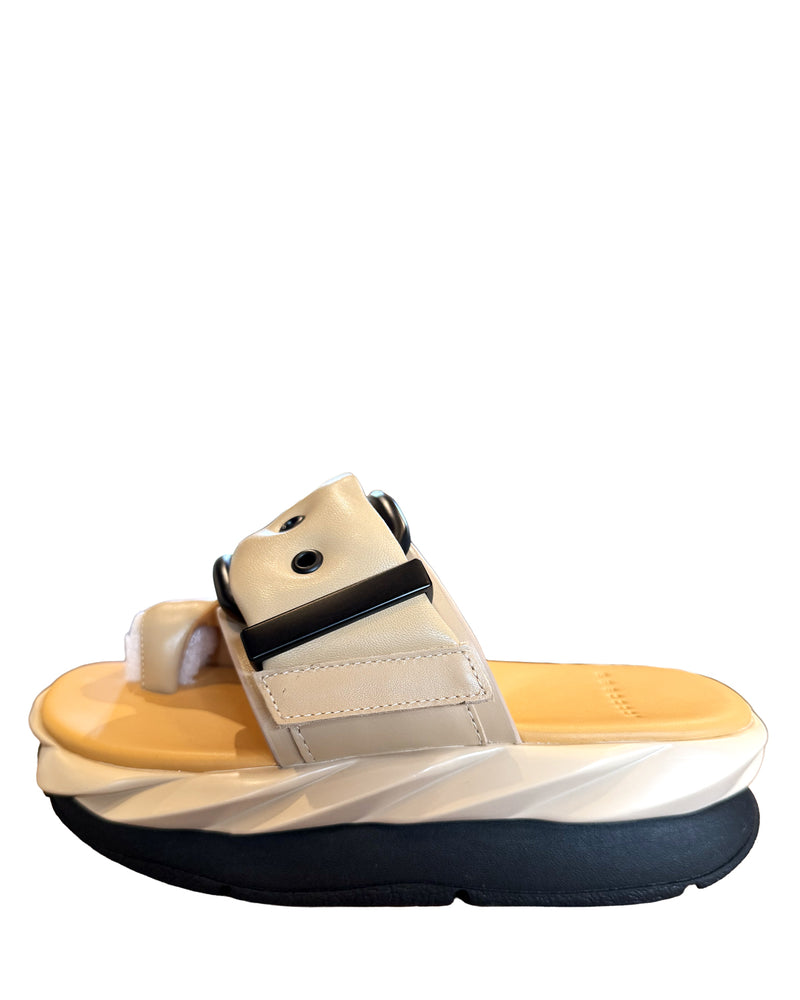 4CCCCEES Mellow Glow in Skin slip on sandal with button detail on white background well heeled vt