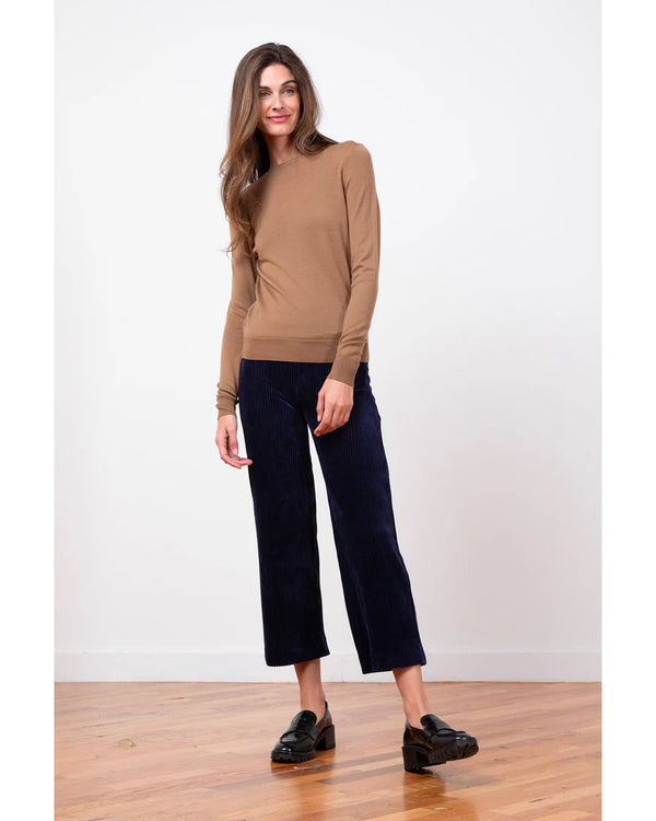 woman wearing Avenue Montaigne Alex Wide Leg Crop in Navy Cord well heeled vt