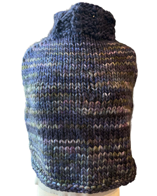 Knitted turtleneck poncho in blue and purple gradient