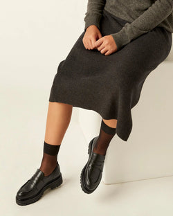 person wearing La Canadienne Gage Weatherproof Loafer in Black on white background well heeled stowe vermont
